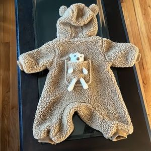 Baby brown shearling onesie with bear detail